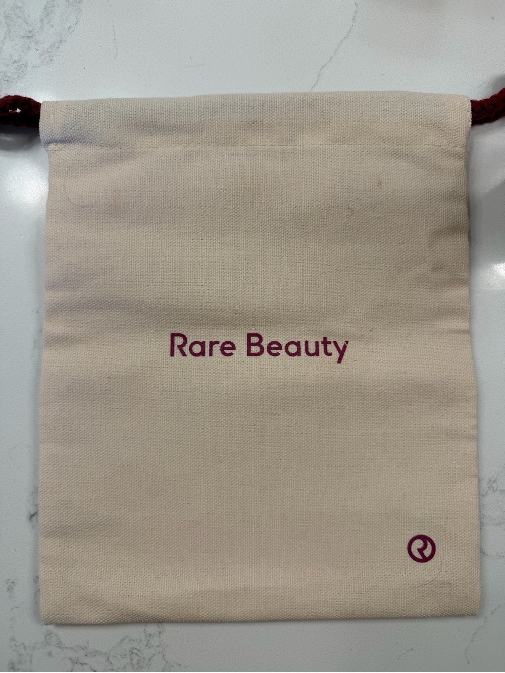 Rare Beauty Beige Drawstring Pouch